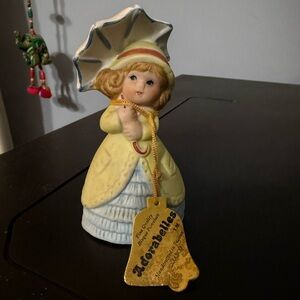 Yellow and Blue Porcelain Figurine